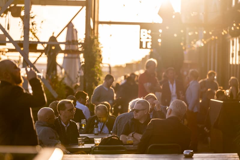 Networking on the terrace at sunset